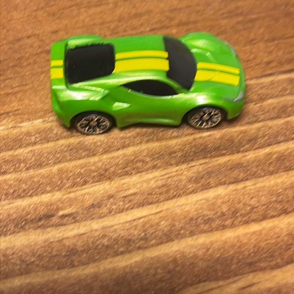 Very Small Hasbro 2020 Micro Machine Green Sports Car with Yellow Stripes